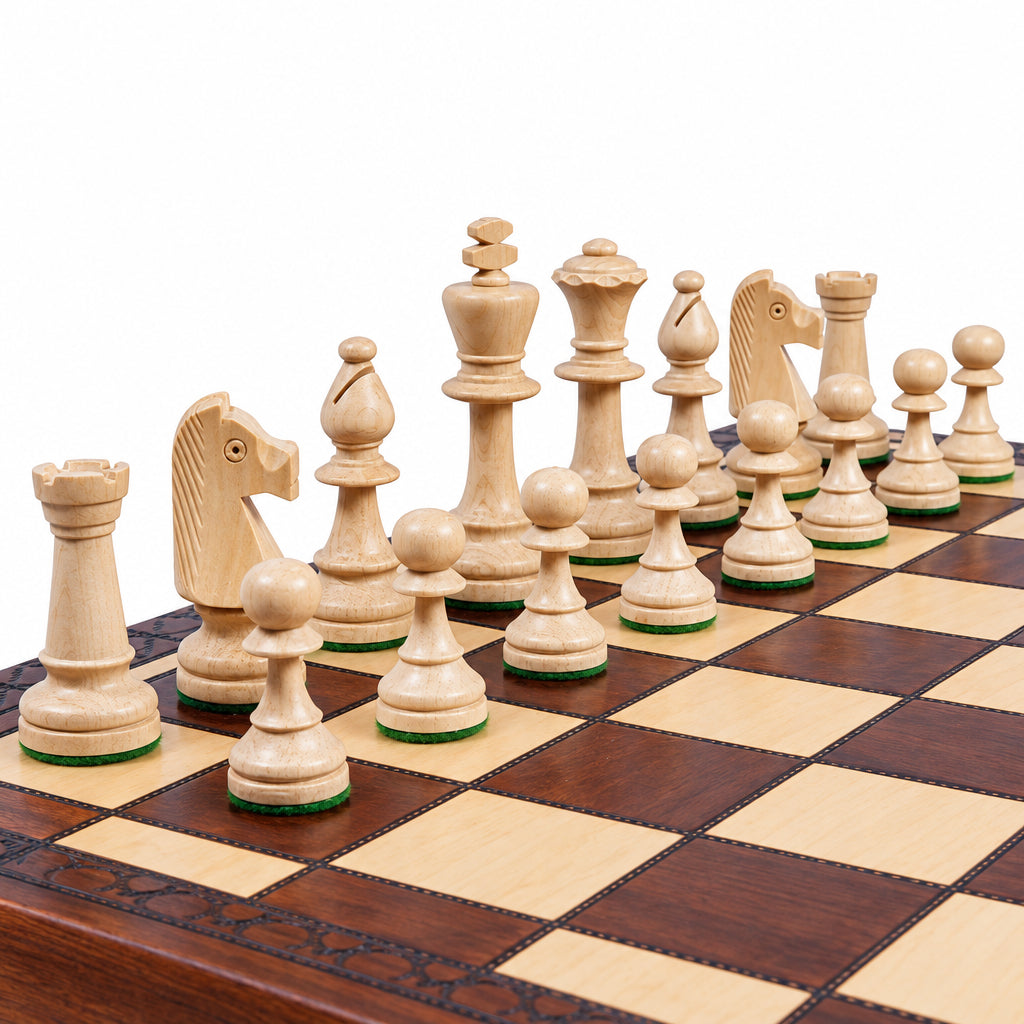 Folding wooden chess set with Staunton pieces, close-up of the light pieces on the board